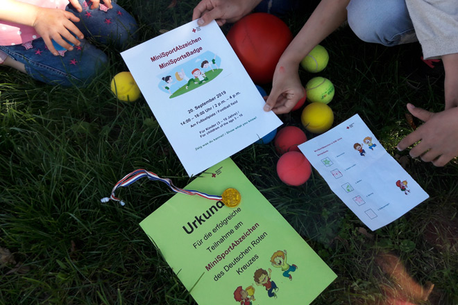 Unna-Massen: Minisportabzeichen am Weltkindertag Infoflyer, Urkunde und Ablaufplan des Minisportabzeichens.
